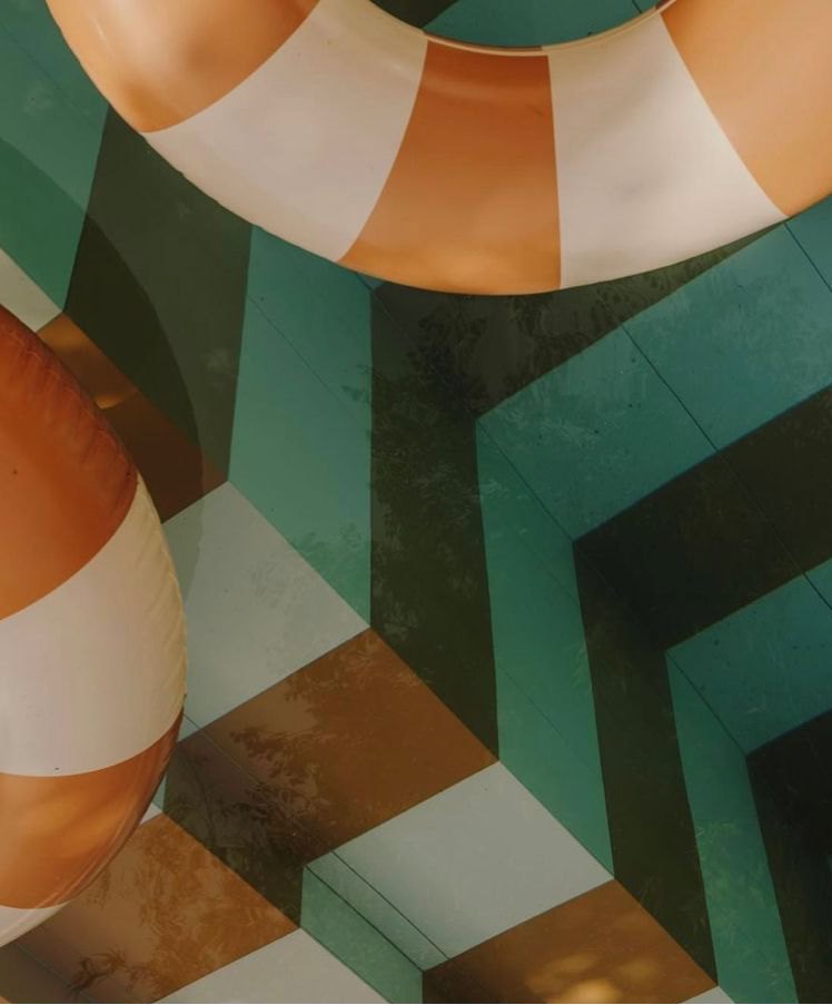 Teal and terracotta glazed tiles in a geometric pattern.